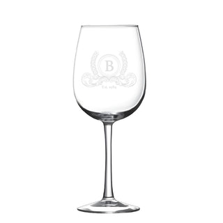 Wine glass with etched design.