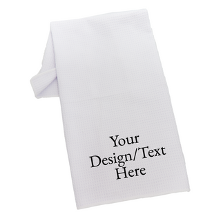 White waffle-weave towel with printed text.