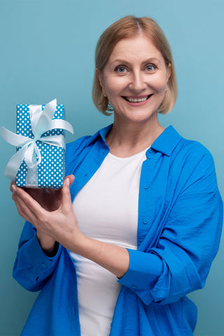 Woman holding a gift on homepage