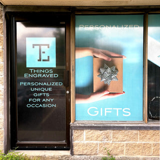 Things Engraved storefront with personalized gift in window.