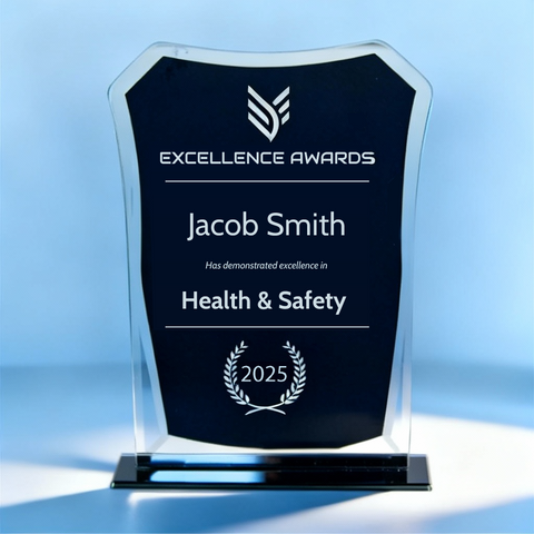 Glass award with Jacob Smith's name and Health & Safety text.