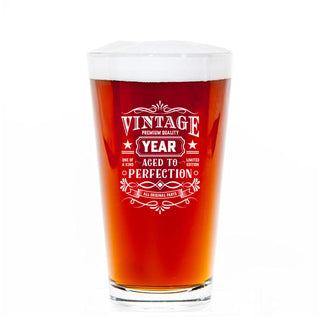 Beer Pint glass with a decal that says Vintage, premium quality, and then a space to add the custom year.  Below it says 'aged to perfection'.  Great birthday gift for men.